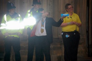 A fair cop? A Tory delegate pretends to shoot demonstrators