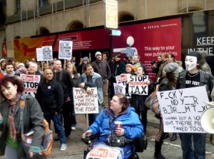 "Bedroom tax"  protesters demonstrating outside Manchester's Town Hall